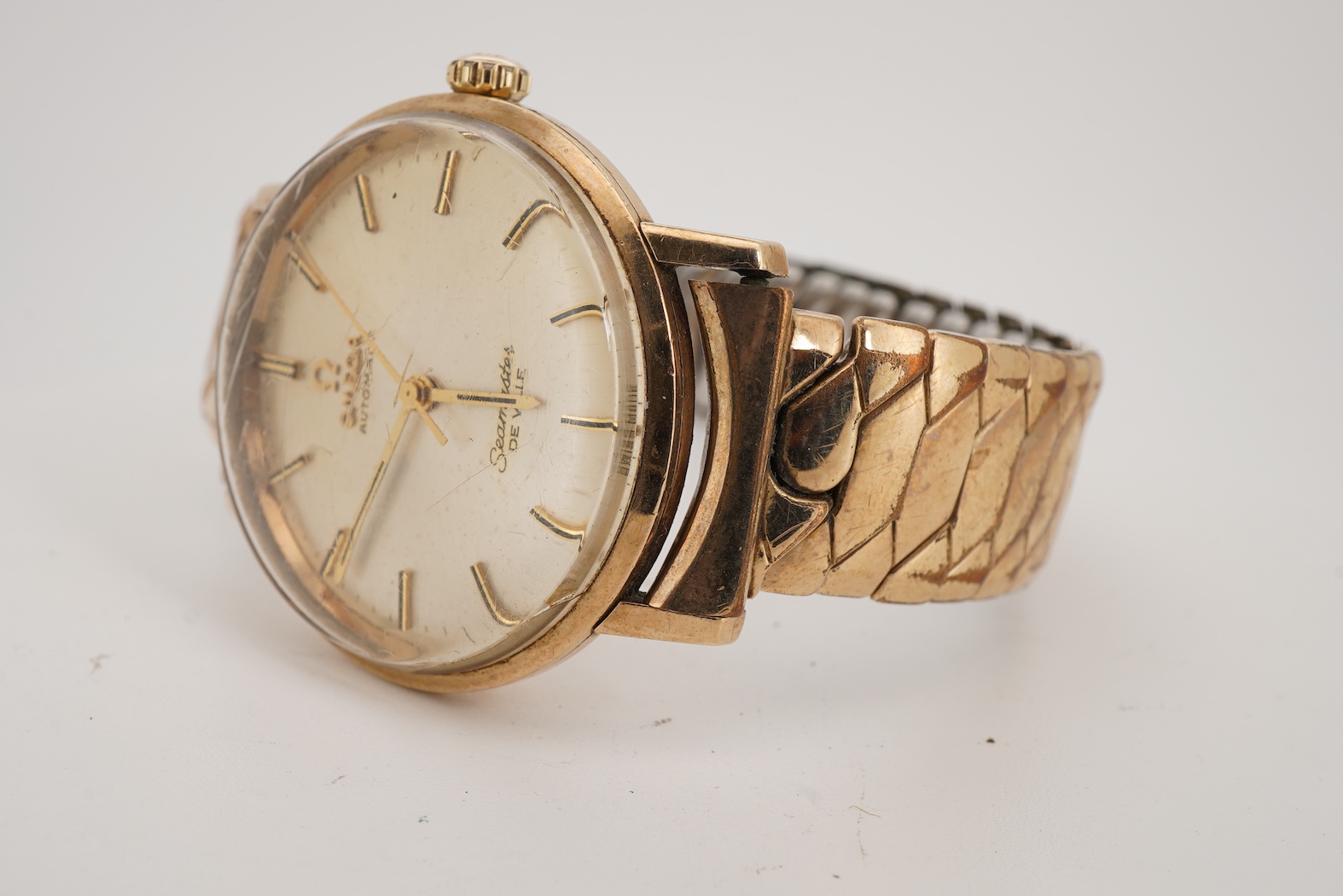A gentleman's gold Omega Seamaster De Ville automatic wrist watch